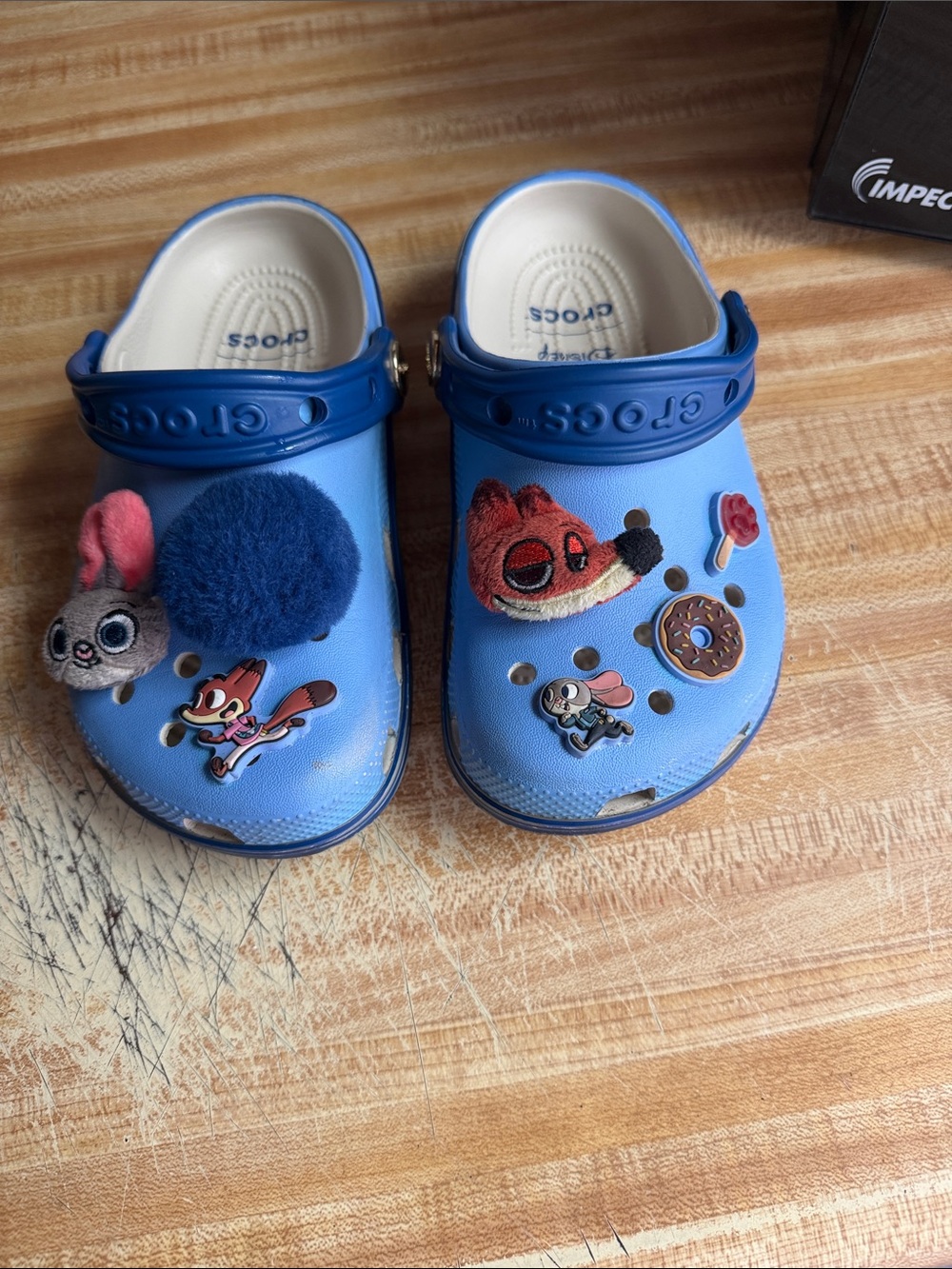 CROCS Kids Light Blue Classic Clogs with Fun Charms